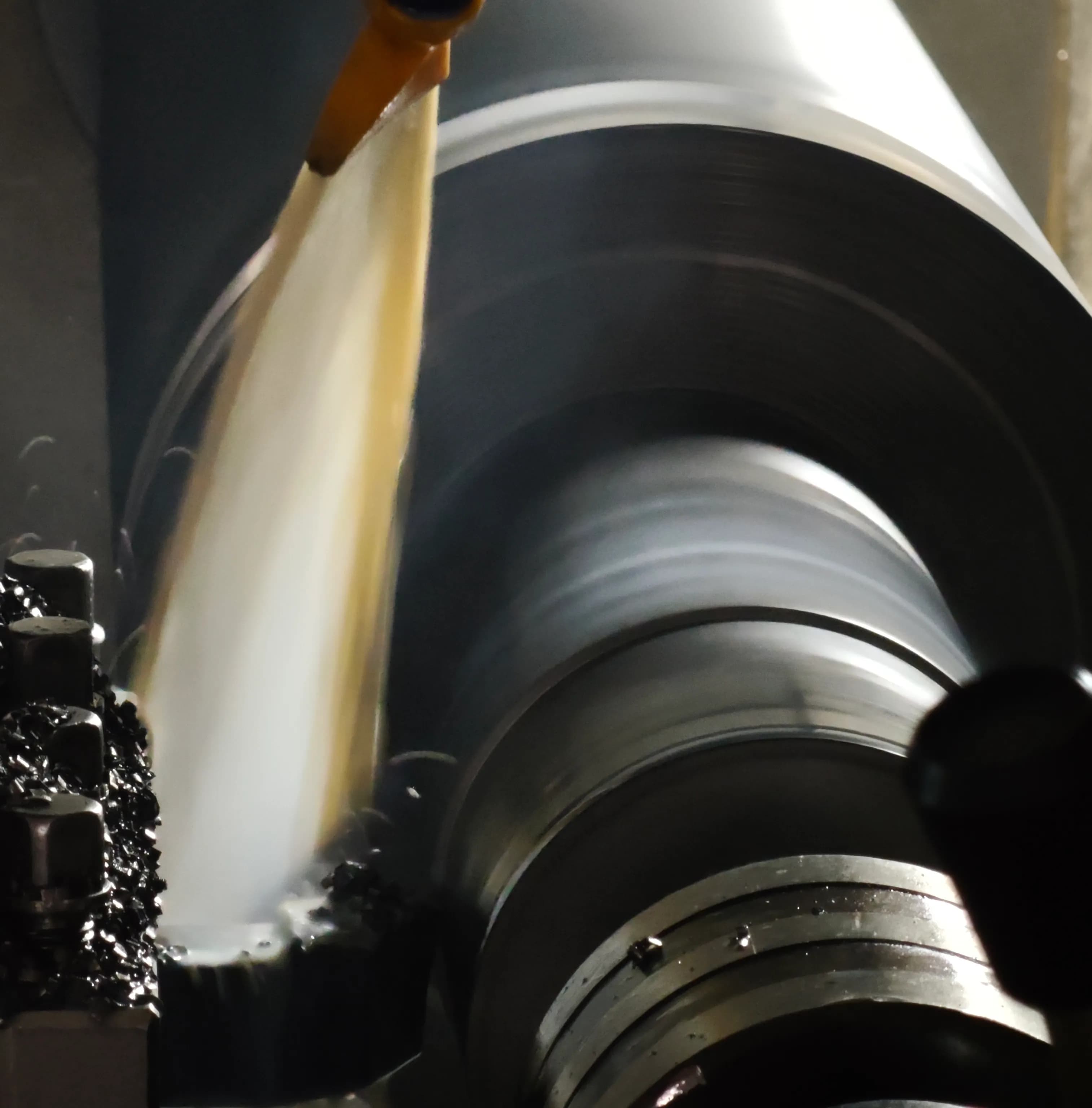 CNC lathe performing rough turning to establish the core diameter of a shaft
