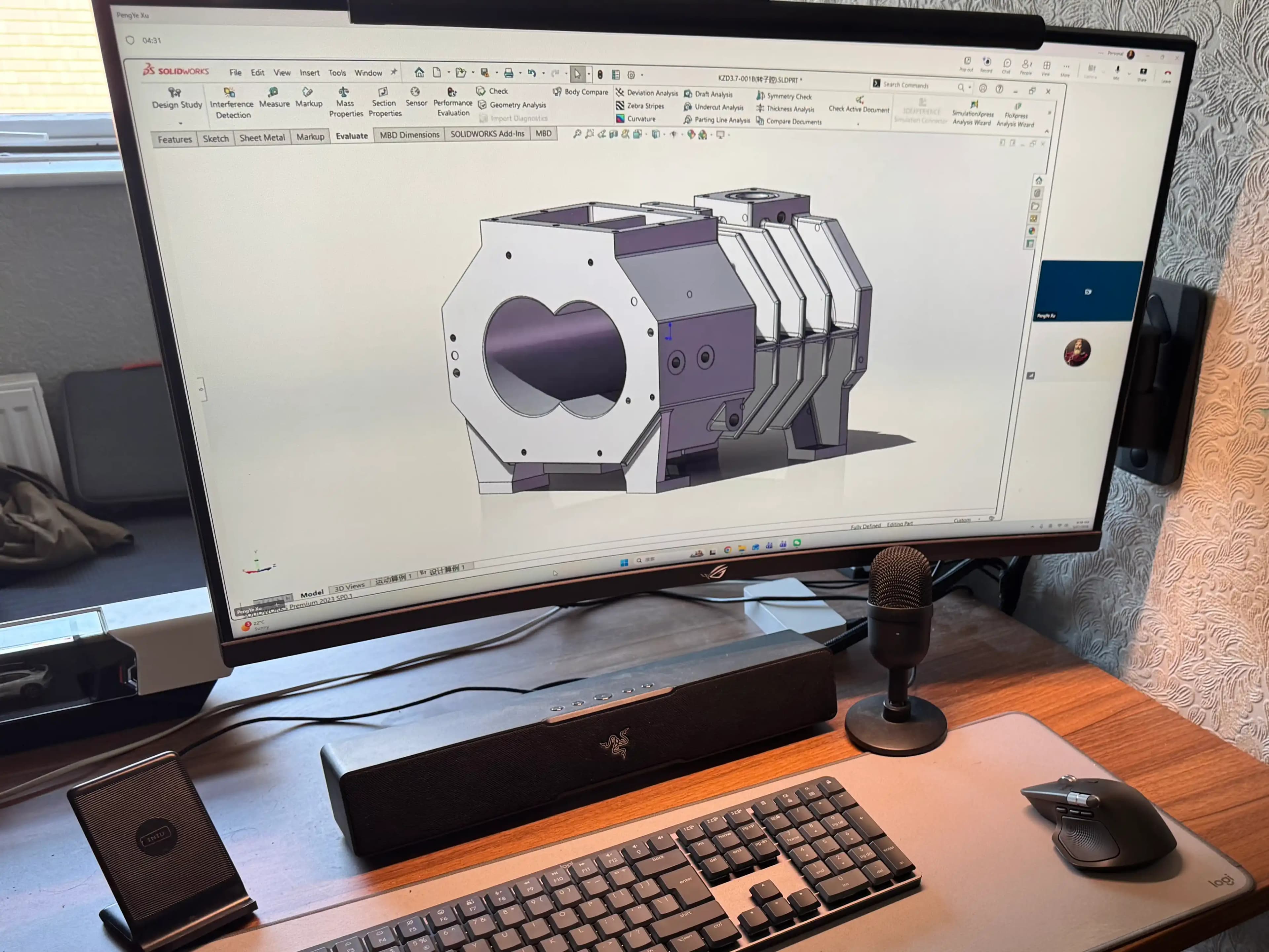 SCPM engineers discussing manufacturing tolerances and inspection points over a technical drawing