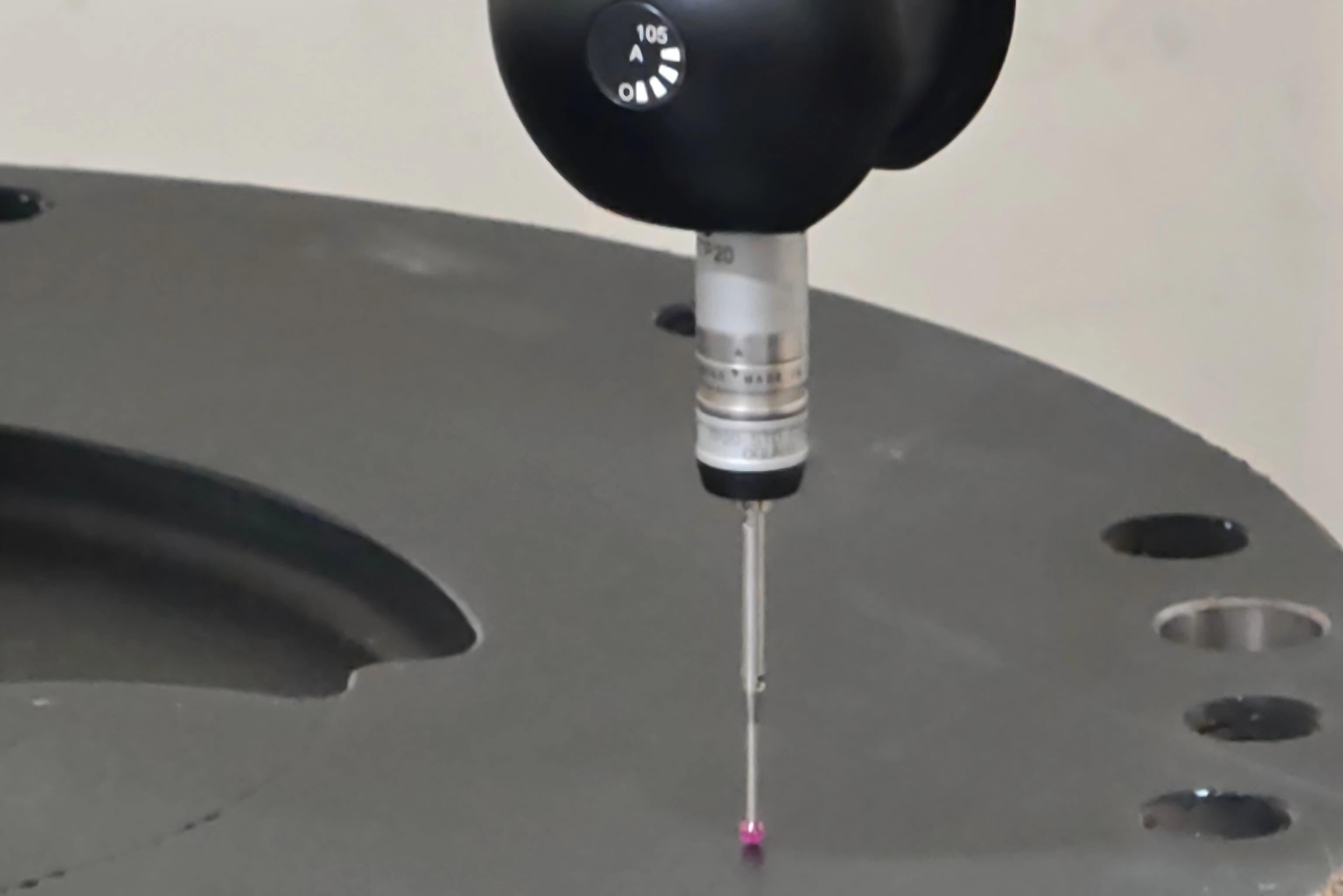 CMM inspection of a CNC-milled rotating equipment component on SCPM's granite-base measurement bench