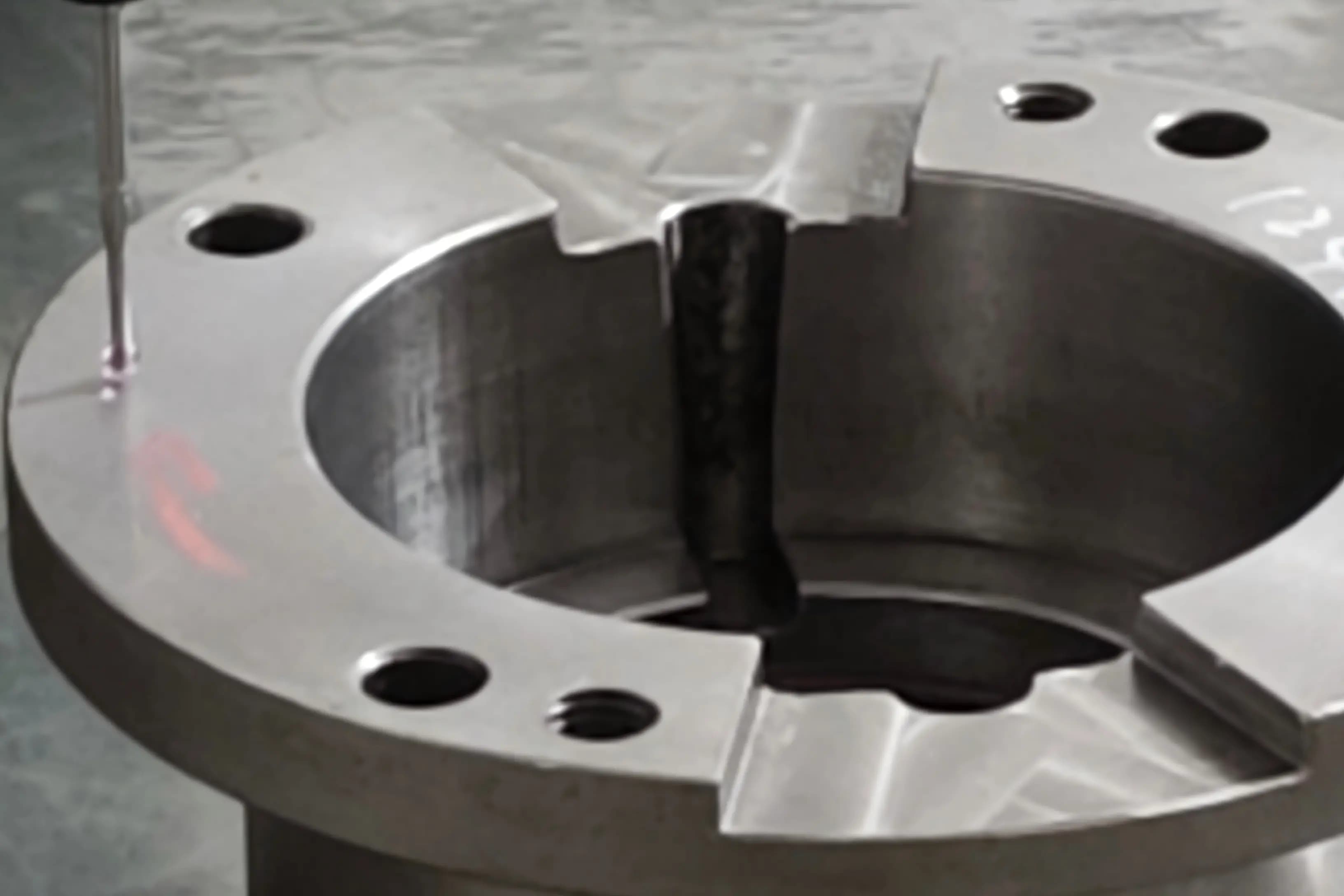CMM inspection of a precision-turned rotating equipment component on SCPM's granite-base measurement bench
