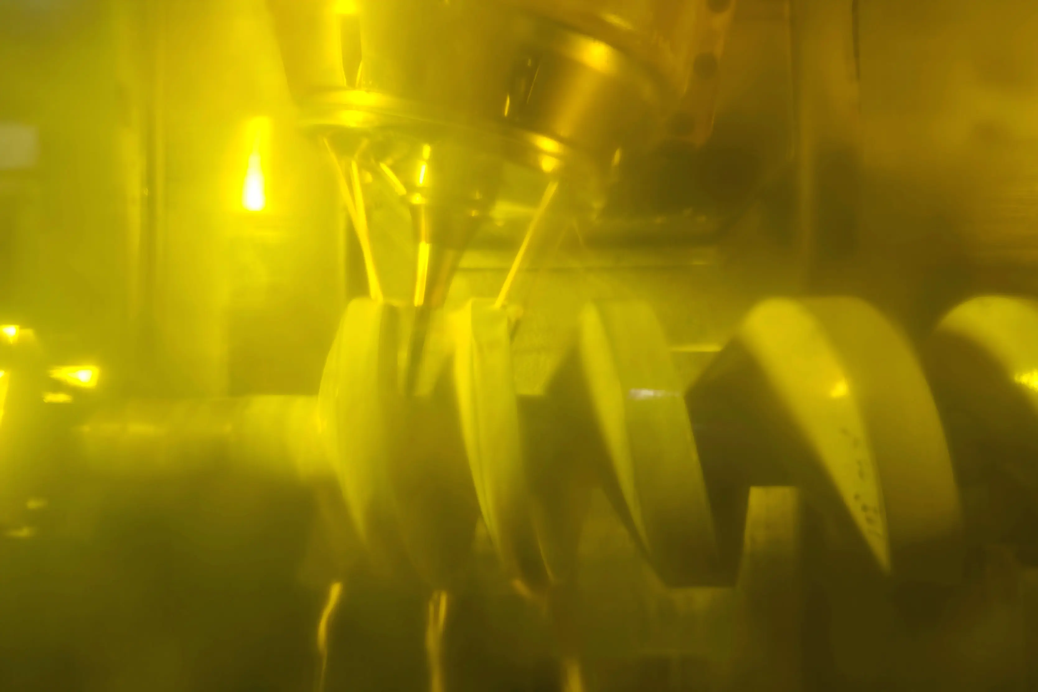Mazak Integrex multi-tasking center turning and milling a compressor rotor in a single setup, with both the turning spindle and milling head engaged on the same workpiece